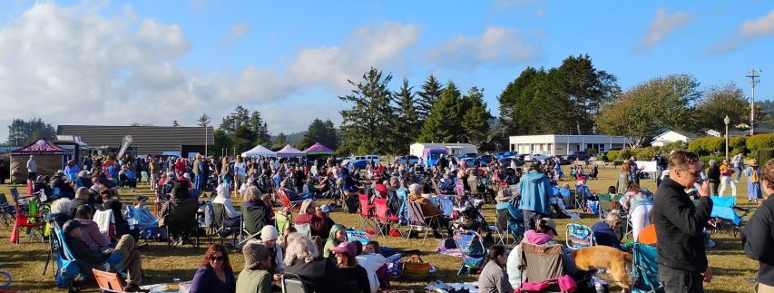 Community members gather with lawn chairs and blankets at Music in the Park in Pierson Park in McKinleyville.