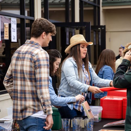 Volunteers and attendees connecting during the Pony Express Days Chili Cook-Off in McKinleyville.