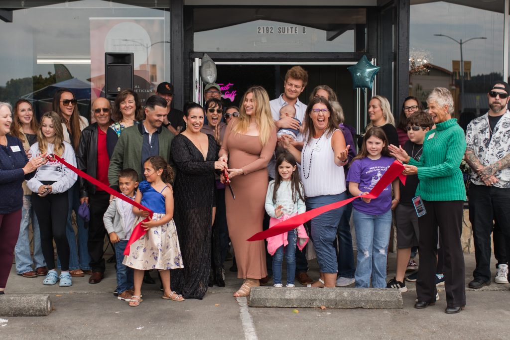 Community members gathered for a McKinleyville Chamber ribbon cutting at a local business.