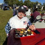 Enjoying the Pony Express Days Chili Cook-Off An attendee samples a variety of chili entries during the Pony Express Days Chili Cook-Off in McKinleyville.