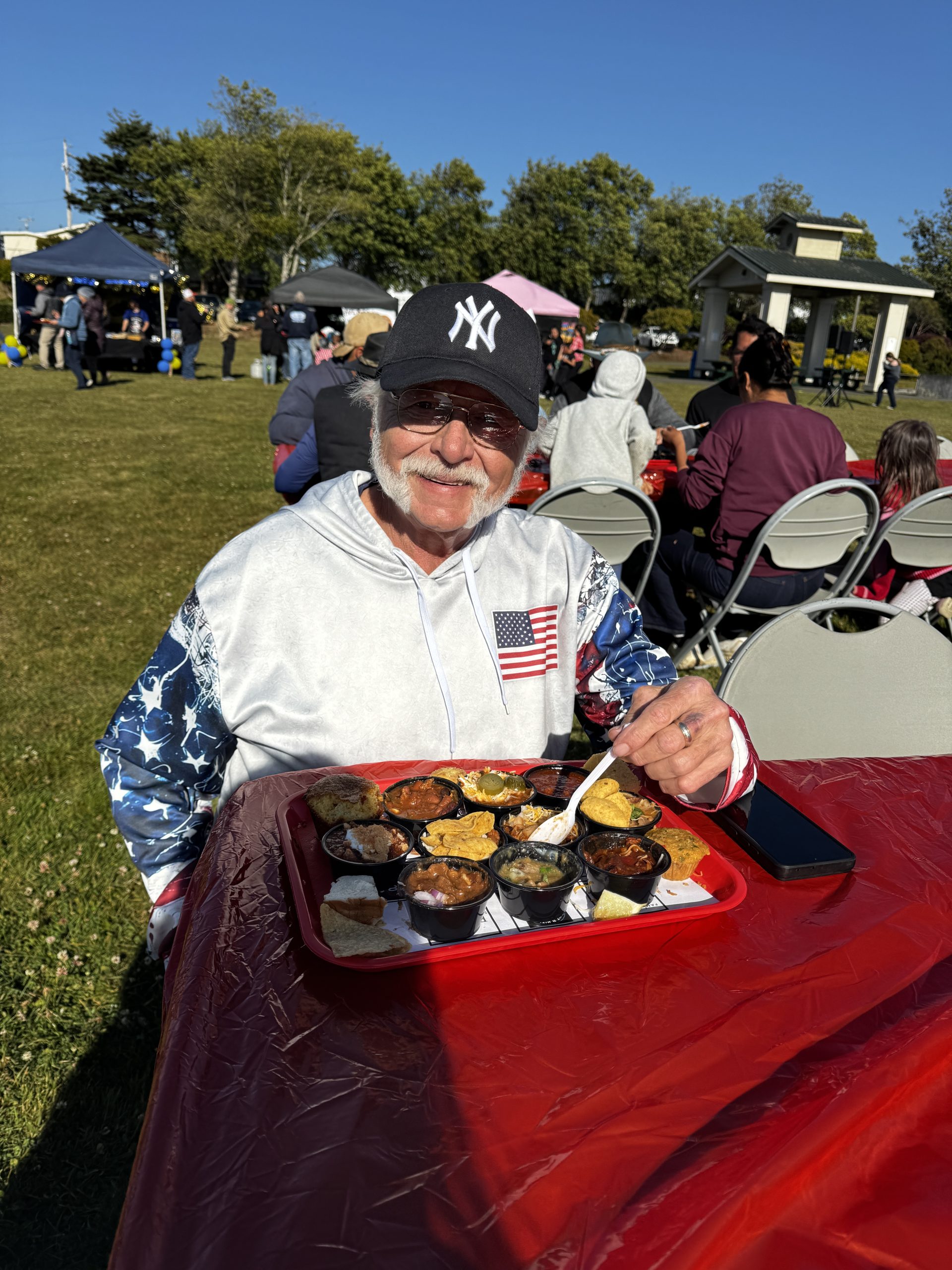 Enjoying the Pony Express Days Chili Cook-Off An attendee samples a variety of chili entries during the Pony Express Days Chili Cook-Off in McKinleyville.