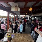 A Crowd Favorite Community members gather at Six Rivers Brewery to watch the Pony Express Days Pie Eating Contest.