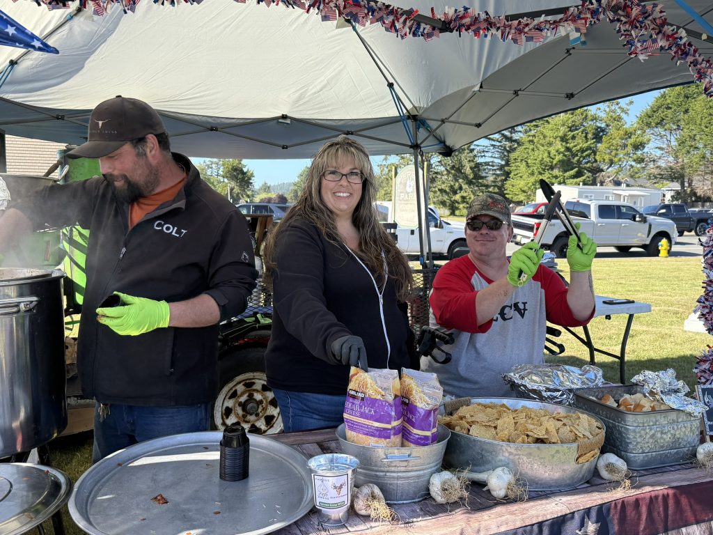 Chili Cook-Off participants serving food during Pony Express Days in McKinleyville.