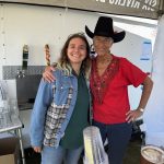 Volunteers and Community Connections at Pony Express Days 2026 Two community members smile for a photo while volunteering at the Pony Express Days Festival beer garden in McKinleyville.