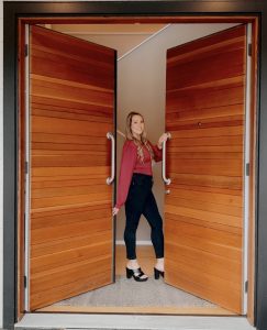 Shelby Huddleson showing off a luxury home