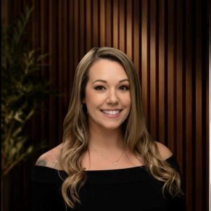 Shelby Hudleson, Realtor, smiling in a professional portrait