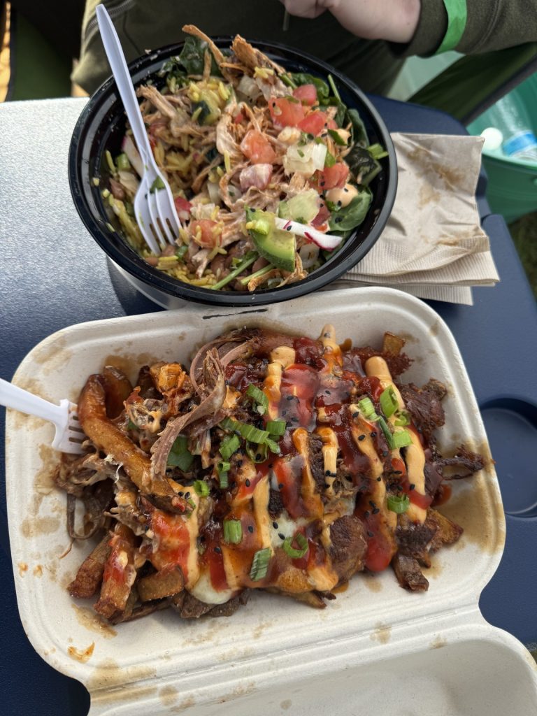 Loaded carne asada fries and a fresh rice bowl topped with avocado, pico de gallo, and vegetables from Manzanilla Kitchen in McKinleyville.
