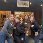 McKinleyville Chamber Members at Sea Goat Farmstand McKinleyville Chamber members smiling together at Sea Goat Farmstand, celebrating local business connections.