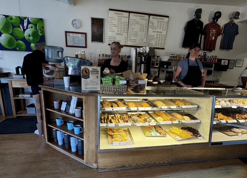 Interior of Ramone's Bakery & Café in McKinleyville featuring fresh pastries, baked goods, coffee, and the bakery display case.