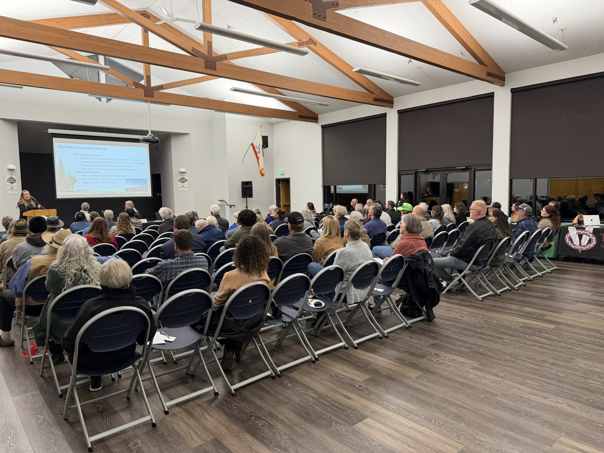 Audience members listening to a presentation at the State of McKinleyville forum in Azalea Hall.
